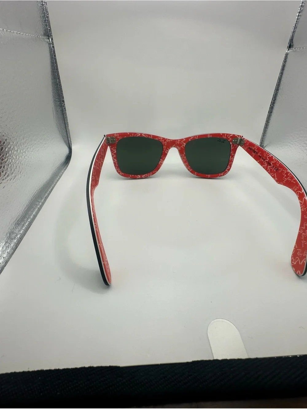 Ray-Ban Black Frame Sunglasses with Red Temples and Green Lenses